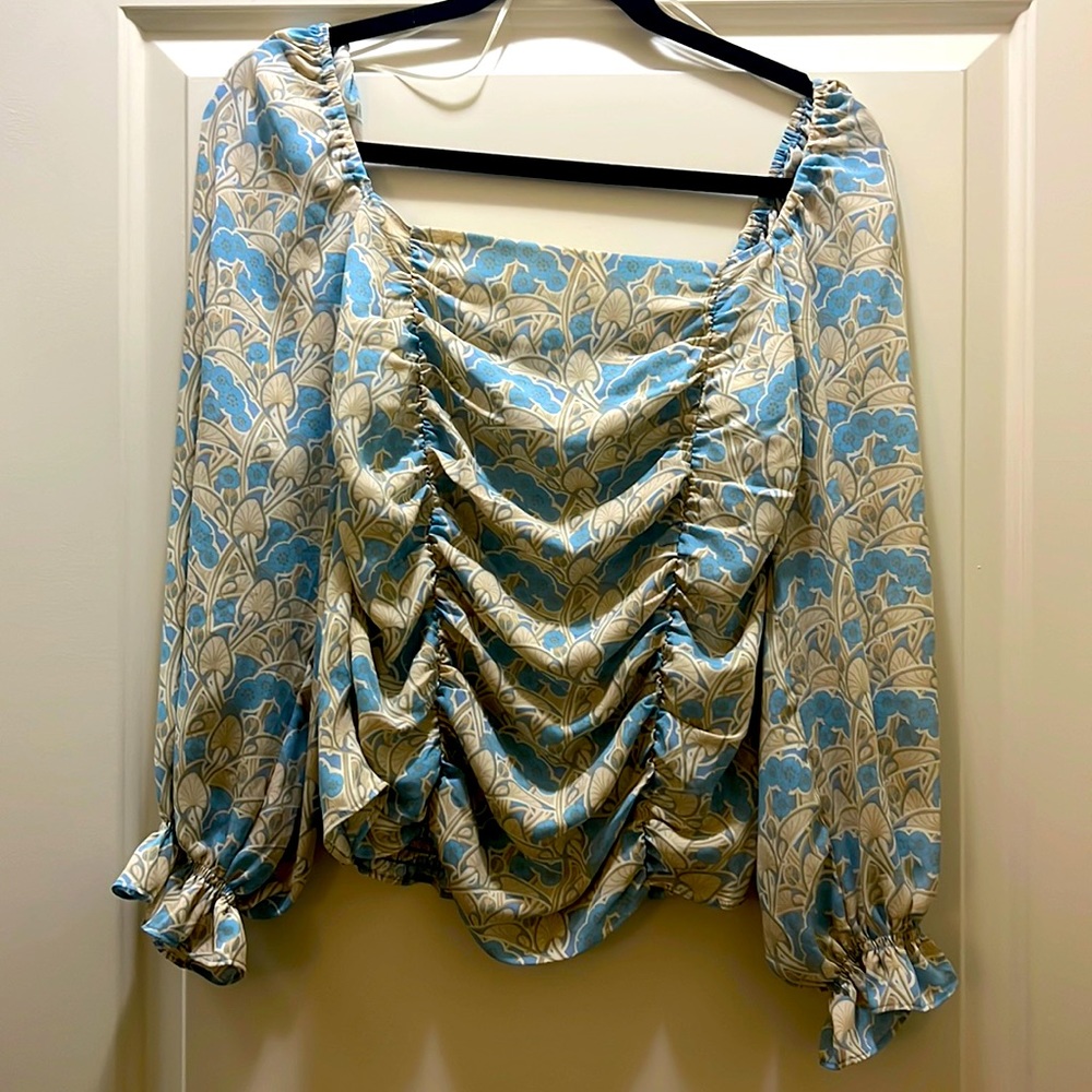 Rose and olive long sleeve floral top.